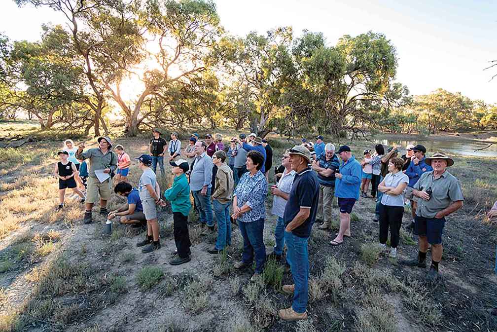 Wildlife ecologist Damien Cook leads the community through Uttiwillock wetland on a native flora and fauna walk.