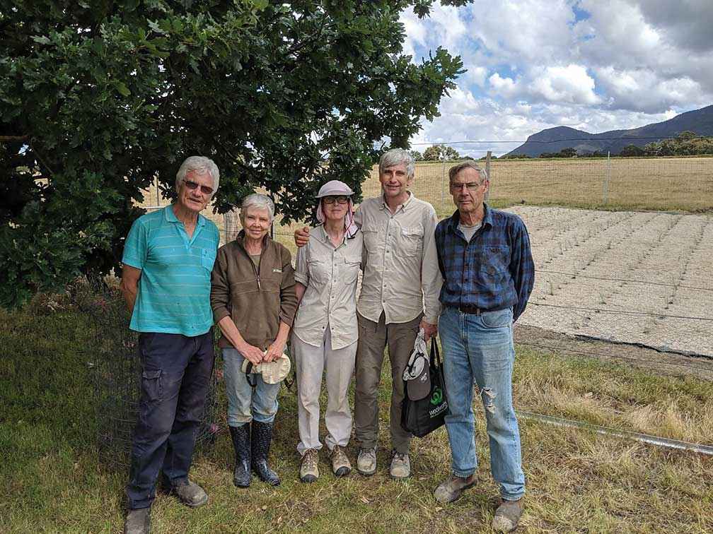 From left, Phil Bennett, Anthea Nicholls, Catherine Pye, Clive Carlyle and Phil Williams after Jallukar Landcare Group’s first plant out of native grassland seedlings in Pomonal in 2018.
