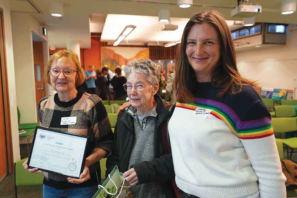 From left, Olga Krasicky, Esme Tyson and Jessica Gerger accept the award for Friends of Kororoit Creek. 