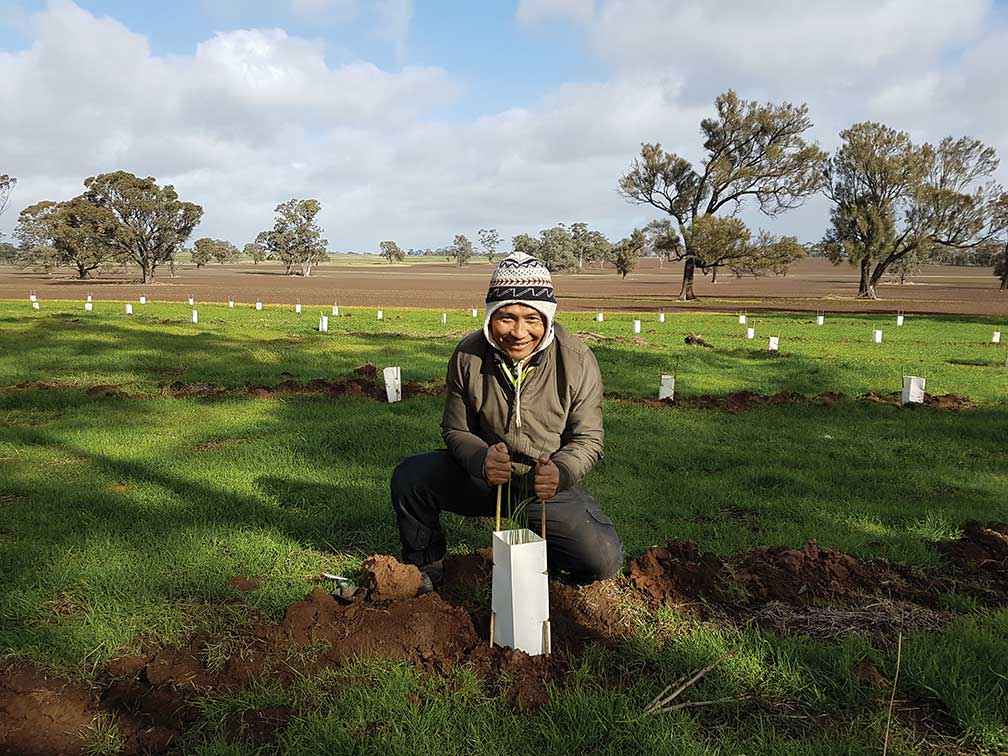 Karen community leader Kaw Doh Htoo enjoying a planting weekend at Dinyarrak. 