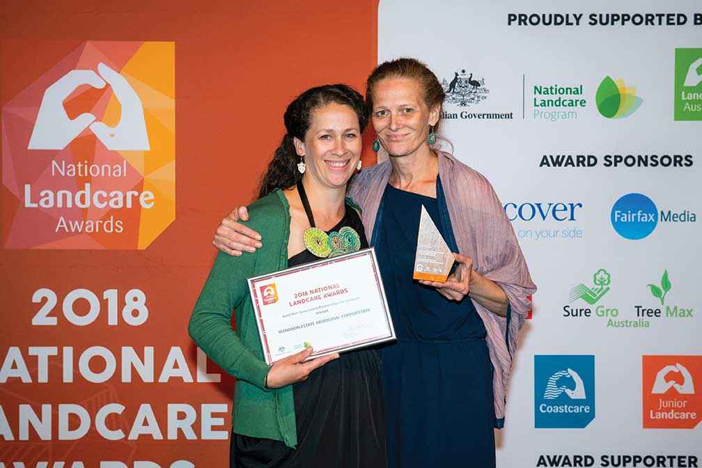 Brooke Collins (left) and Jacqui Wandin accepted the Australian Government Partnerships for Landcare Award on behalf of the Wandoon Estate Aboriginal Corporation.