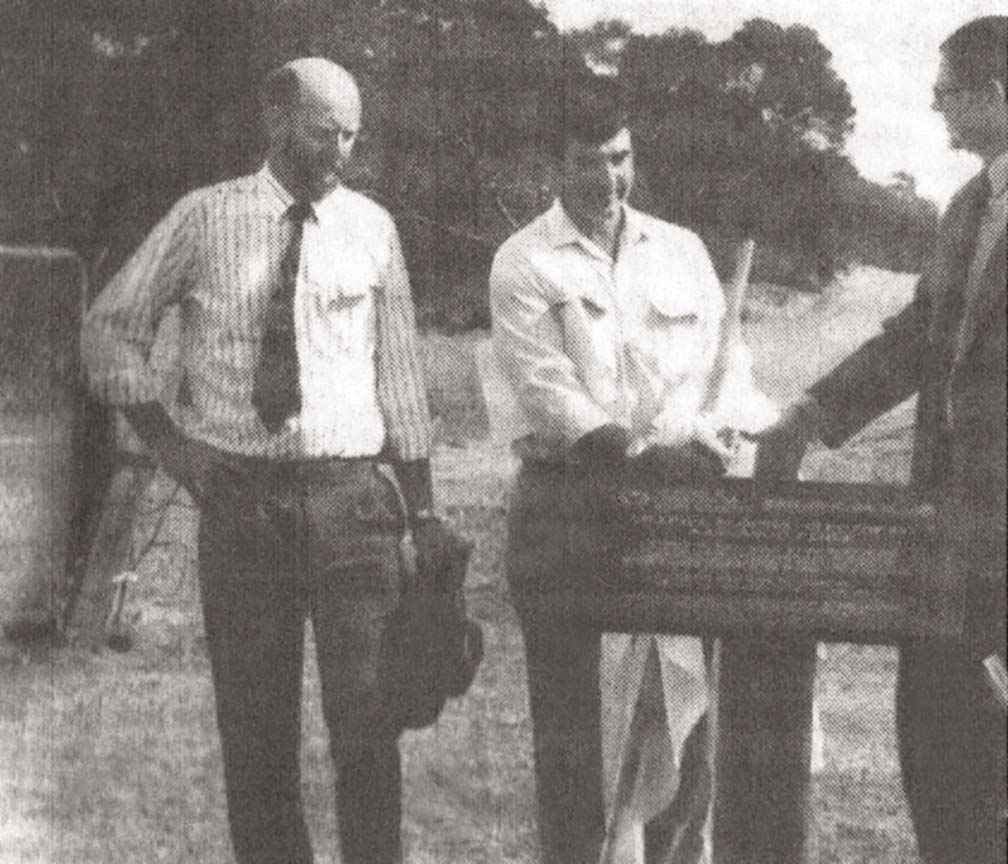 John Cook (from left) with Ron Hards and Craig Bildstein at the launch of the kangaroo fence in 1993.