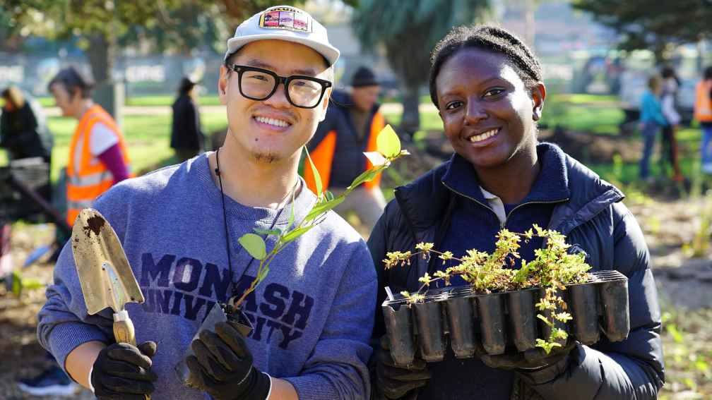 Xavier Xu and Morayo Adeyemi at a Port Phillip EcoCentre planting day. Photo: Lisa Horler.