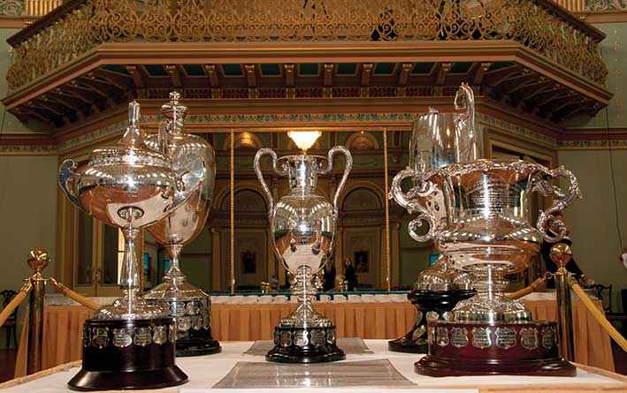 The historic Hanslow Cups that were presented to leading Victorian farmers for their efforts in soil conservation from 1940 were on display in the ballroom at Government House.